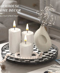 12 Inch Round Black And White Checkered Lazy Susan Turntable with decorative candles and vase, perfect for kitchen centerpieces.