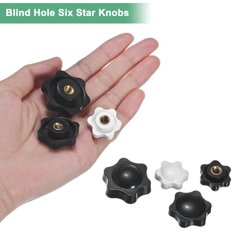 Six Pack Star Knobs With Quarter Inch Female Thread Hex Head Blind Hole Clamping Grips in black and white on a hand