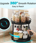 Two Tier Wooden Lazy Susan Spice Rack With 360 Degree Rotation in black, holding jars and spices on a countertop.