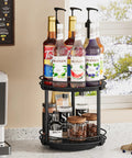 Two Tier Wooden Lazy Susan Spice Rack With 360 Degree Rotation for countertop displaying syrup bottles and coffee supplies, black finish.