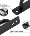 Close-up of black zinc alloy barn door handle with 5-inch hole center, back plate design, and screw detail for sliding closet doors.