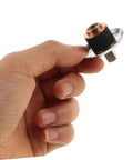 Hand holding stainless steel blender coupling replacement pin for easy installation, durable drive coupling accessory for secure connection.