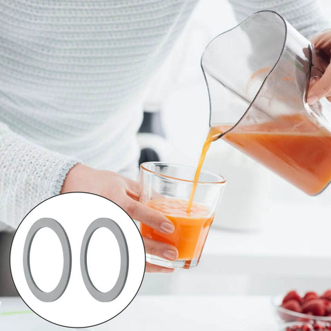 2 Pack Blender Gasket O-Ring Replacement For Oster Osterizer Blenders Gray Rubber Seal next to person pouring juice