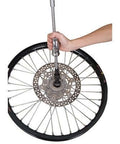 Blind Hole Bearing Puller Kit With Slide Hammer And Collets, 8mm Through 30mm, demonstrated on a bicycle wheel hub for bearing removal.