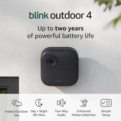 Wire-free two-camera outdoor security kit with Sync Module 2 delivers 1080p HD day and infrared night vision mounted on wall