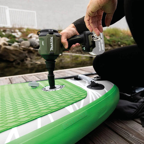 Person using Outdoor Adventure 18V LXT Brushless Cordless High Speed Blower and Inflator Tool Only With 447 MPH Max Air 39 CFM on inflatable water device.