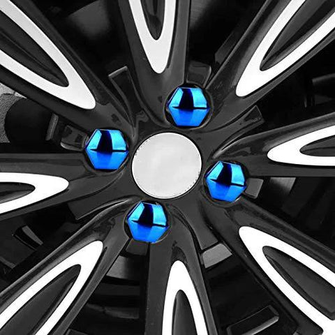 Close-up of car wheel with 17mm 20 Piece Wheel Nut Cap Set Anti Rust Protection Covers for Car Wheel Nuts and Hubs in blue.
