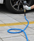 Hybrid Air Hose Three Eighths Inch By Twenty Five Feet 300 PSI Heavy Duty Lightweight Kink Resistant in use with tire gauge