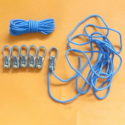 Assorted blue ropes and metal hooks on an orange background for secure utility cart hauling.