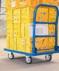 6 Inch Heavy Duty Plate Casters Set Of 4 With 360 Degree Swivel And Ball Bearing For Quiet Operation 200 Kg Per Wheel 600 Kg Total Load Rust Proof PU Wheel And Iron Bracket 2 With Brake Lock And 2 Without installed on a blue cart.