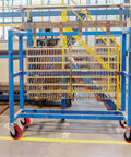 Heavy Duty Industrial Casters 5x2 Inches With Polyurethane On Polyolefin Core Wheel on a blue industrial cart
