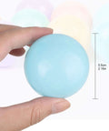 Hand holding a light blue macaron color ocean ball, 5.5 cm diameter, showcasing size for 5 Mixed Colors Macaron Ocean Ball set.