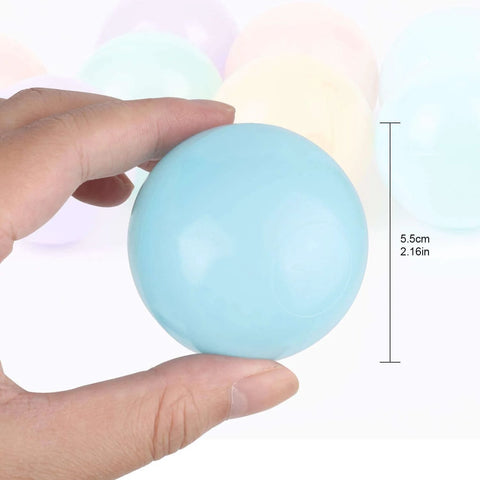 Hand holding a light blue macaron color ocean ball, 5.5 cm diameter, showcasing size for 5 Mixed Colors Macaron Ocean Ball set.