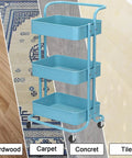 Blue three-tier rolling cart with swivel casters on various flooring types including hardwood, carpet, concrete, and tile.