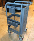 Utility cart with heavy duty stem caster wheels providing quiet smooth operation and dual locking brakes for mobility.