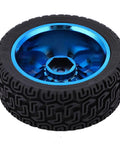 Close-up of a black rubber tire with a blue metallic center hub for robotics or model vehicles.