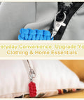 Close-up of blue and red Paracord Zipper Pulls 80 Mm For Backpacks And Luggage Polyester Rope with rust resistant metal clasp.