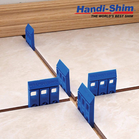 Heavy Duty Reusable Plastic Construction Shims Set Of 100 For Spacing Leveling And Plumbing Projects in use on tile floor