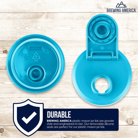 Wide Mouth Plastic Jar Lids Four Pack USA Made Flip Cap Screw Top Pour Spout Leak Proof Airtight shown in blue on wood background