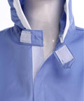 Close-up of durable unisex lab coat for men and women with hooded design in blue 100 percent polyester lab jacket, medium size.