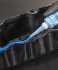 Auto Grade RTV Silicone Gasket Maker Blue 587 Pro Grade High Temp Oil Resistant Sensor Safe Sealant being applied to engine gasket