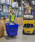 Heavy Duty Commercial Utility Cart Workhorse With 16 Bushel Capacity And 1000 Pound Load Capacity Steel Base And Poly Box Basket On Rolling Wheels For Offices Warehouses Restaurants And More Blue ReadySpace in warehouse being used for material handling.