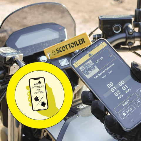 Motorcycle handlebar with smartphone showing X System 3.0 Plus Electronic Automatic Motorcycle Chain Lubrication System With Bluetooth App Control.
