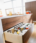 Open kitchen drawer showcasing Blum Tandem Plus BLUMOTION Concealed Undermount Drawer Runner Kit (6 Pack), 21-Inch, full extension.