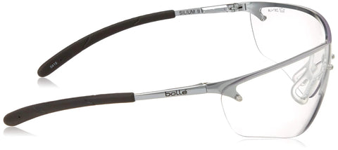 Side view of Bollé Silium Safety Eyewear with silver metal frame and anti-fog coated lenses, showing flexible temples.
