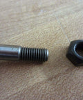 Close-up of Bolt Kit With Nut And Spacer For One Quarter Inch Shaft Diameter Head Size Seven Sixteenths Inch Total Length One And Five Eighths Inches Rexnord 012914 PKIT SNS 162 STL showing the threaded section and nut.