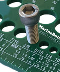 Close-up of Bolt And Screw Gauge For Standard And Metric Coarse And Fine Diameters Lengths And Thread Pitch showcasing thread measurement.