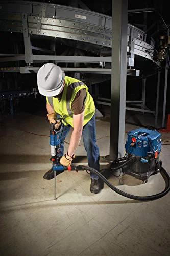 Worker using One And One Eighth Inch SDS-Plus Bulldog Xtreme Max Rotary Hammer For Concrete Drilling And Chiseling In Masonry