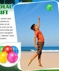 Child playing on beach with green 200 Pcs Knobby Balls 6.3 Inch Soft Bouncy Balls Bulk Inflatable Sensory Toys