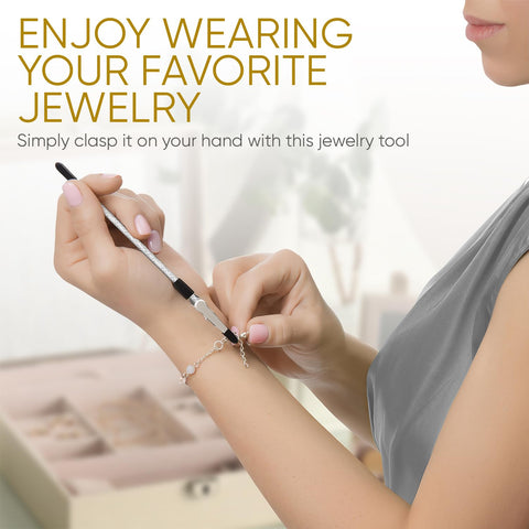 Woman using Bracelet Fastener Helper Tool For Easy On Jewelry Clasp Clip For Bracelets Necklaces And Watches Portable Metal Silver Life Saver No Slip Grip And User Friendly Design to secure bracelet clasp.