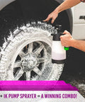 Person using Brake Buster Wheel Cleaner with non-acid formula on vehicle wheel to remove brake dust and grime effectively.