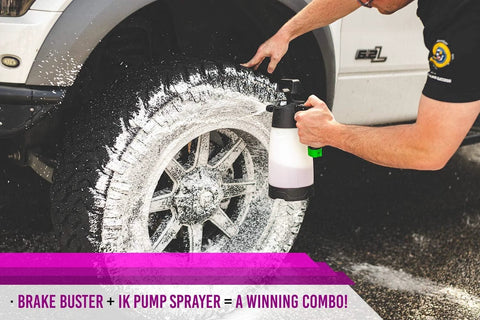 Person using Brake Buster Wheel Cleaner with non-acid formula on vehicle wheel to remove brake dust and grime effectively.