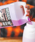 Pouring Brake Buster Wheel Cleaner With Non Acid Formula For Safe Use On All Wheels into a container