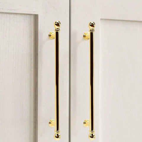 10 Pack Polished Brass Cabinet Pulls 7.5 Inch Hole Center Solid Zinc Alloy Drawer Handles installed on white cabinet doors