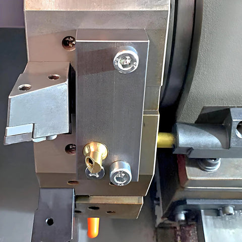 10mm brass ball CNC nozzle installed on jewelry lathe, close-up; part of 5 Piece 10mm Brass Ball CNC Nozzle Set With Slanted Hole Extend Coolant Nozzle For Jewelry Lathes And Jewelry Carving Milling Machines Screw Lock High Pressure Oil Cooling Nozzle For Precision Machining.