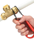 Hand using Disconnect Tong For Brass Push To Connect Fittings One Half Inch Three Quarter Inch And One Inch Removal Tool For Demount In Tight Spots