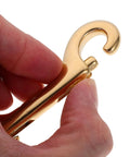 Close-up of hand holding one of the 4 Pack 3.5 Inch Brass Double Ended Bolt Snap Clips Heavy Duty for dog leashes and boating gear.