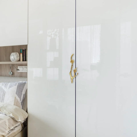Brass Flower Branch Cabinet Handle 5.91 Inch Blossom Drawer Pull Knob installed on white wardrobe door