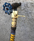Solid Brass Garden Hose Quick Connect Set With 3/4 Inch GHT attached to outdoor faucet, blue handle, hose view