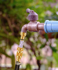 Garden Hose Quick Connector Set Three Quarters Inch GHT Brass No Leak Adapters installed on outdoor faucet