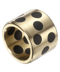 Close-up of a brass graphite bushing, 20mm bore, 26mm outer diameter; part of 3 pieces sleeve bearings 20mm bore and 20mm height.