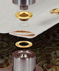 Brass Rolled Rim Grommets and Spur Washers Size 4 Heavy Duty Set 720 Sets being installed on fabric
