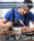 Man assembling electronics with Brass Hex Standoff Spacer Set 50 Pcs M3 Threaded Spacers for Drones and PCBs