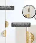 Leaf Shaped Cabinet Handles Set, Solid Brass With Brushed Gold Finish installed on cabinet doors with magnified hole view