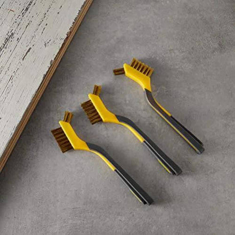 Top view of Brass Mini Brushes for Cleaning, Soft Grip, 1/2 inch, Yellow/Grey, 3-Pack on a workshop table