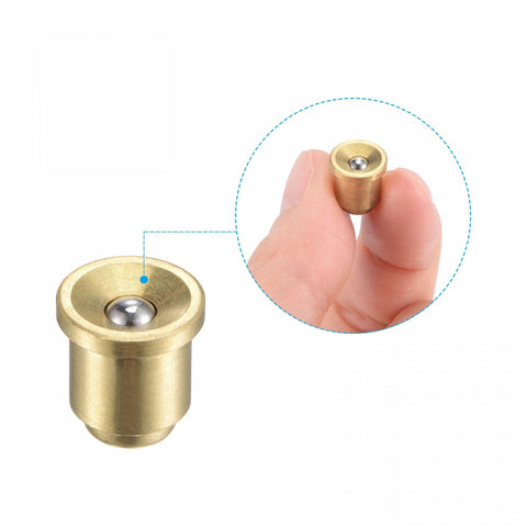Close-up of a single Brass Push Button Flange Oil Cup 8mm Ball Oiler for continuous drip lubrication in mechanical joints, shown in hand.